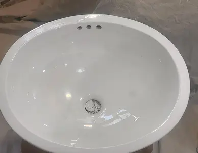 Refinished sink with a smooth glossy surface