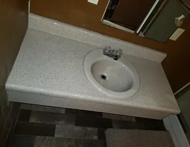 Restored bathroom sink after complete resurfacing
