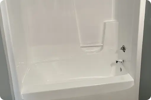 Shower stall refinished to a new smooth surface