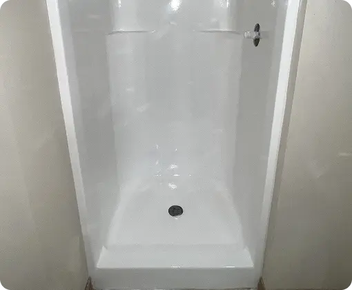 Bathroom shower stall restored with reglazing